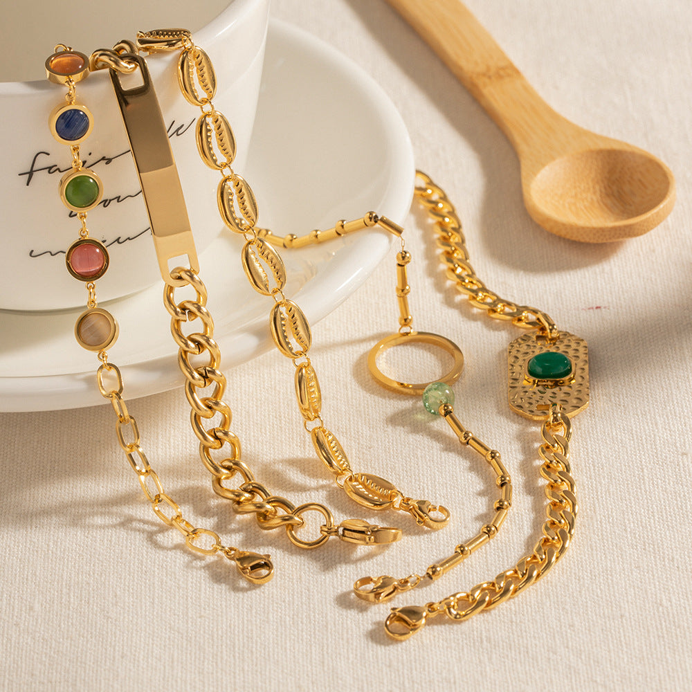 Wholesale Ring Green Stone Stainless Steel Fantasy Cat's Eye Hollow Shell Bracelet ACC-BT-WanX004