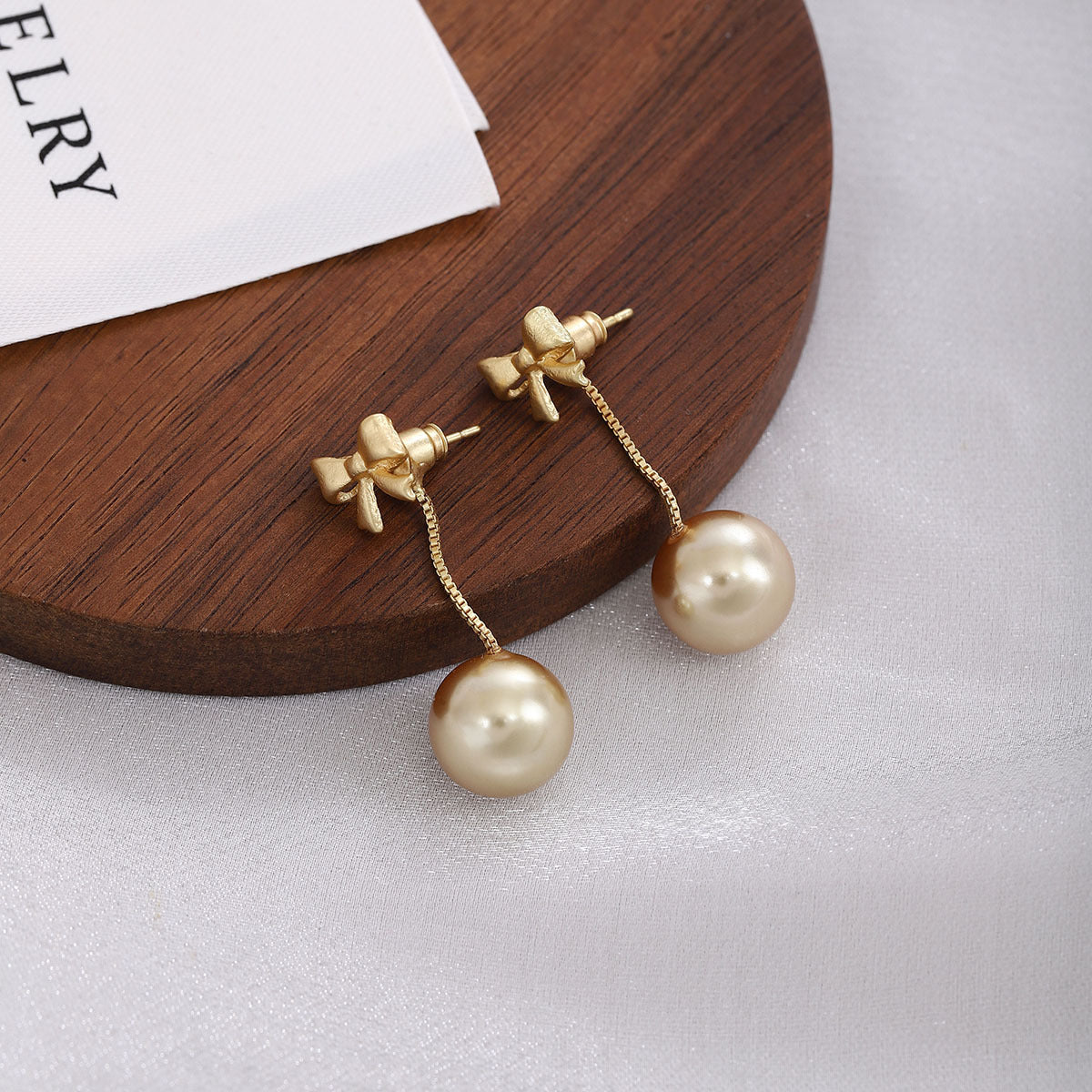 Wholesale Champagne Pearl Bow Earrings