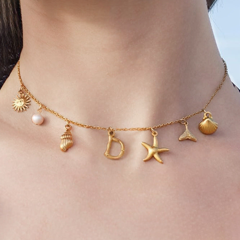 Wholesale Bohemian Shell Starfish Gold Electroplated Copper Alphabet Pendant Necklace for Women Fashion Accessory