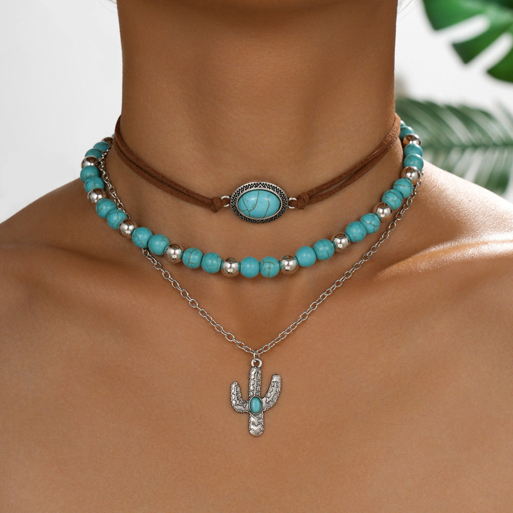 Wholesale Women' s Alloy Cactus Pendant Imitation Turquoise Necklace Set Retro