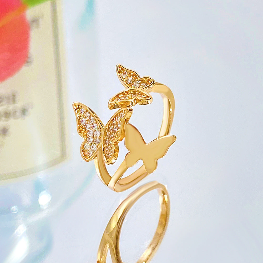 Wholesale Three copper and diamond butterfly rings