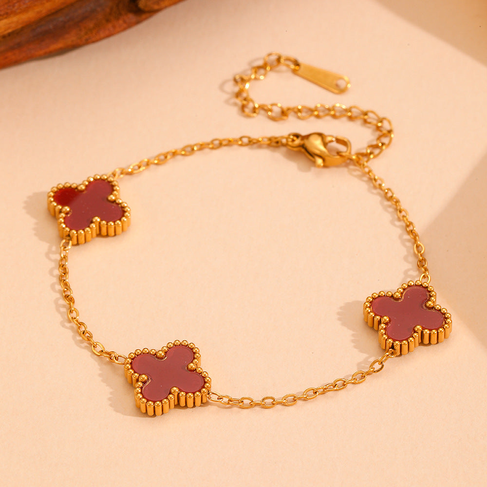 Wholesale Fashion stainless steel three four-leaf flower jewelry new titanium steel does not fade small flower jewelry suit