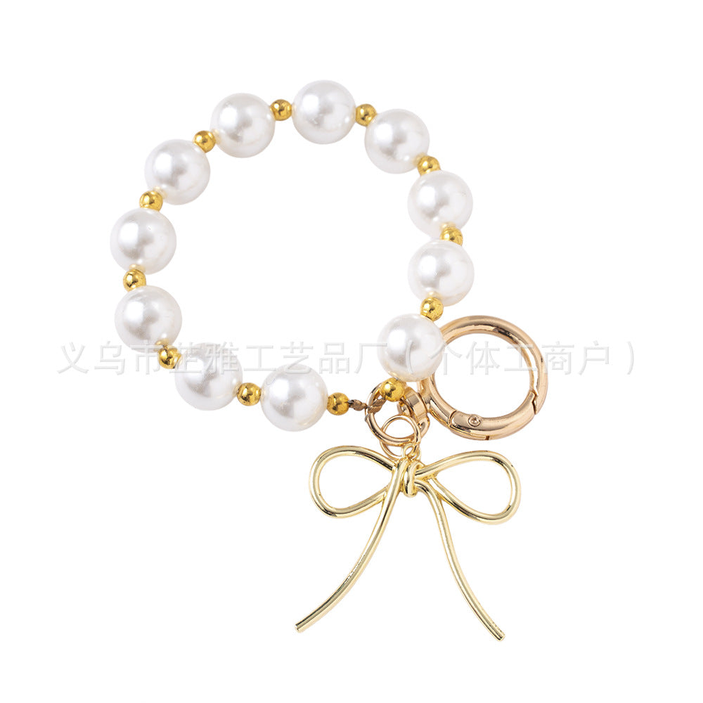 Wholesale Luxurious Resin Alloy Pearl Bow Keychains