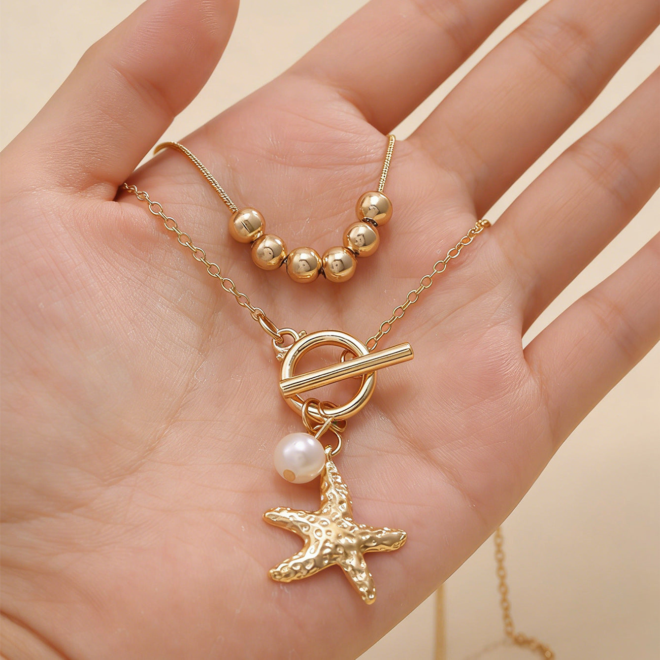 Wholesale Electroplated Iron Shell Starfish Pendant Necklace Ocean Themed Casual Chain Women S Fashion Accessory