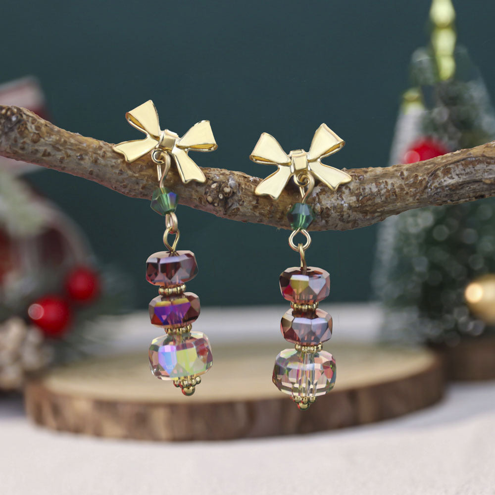 Orecchini in cristallo con stella e fiocco all'ingrosso