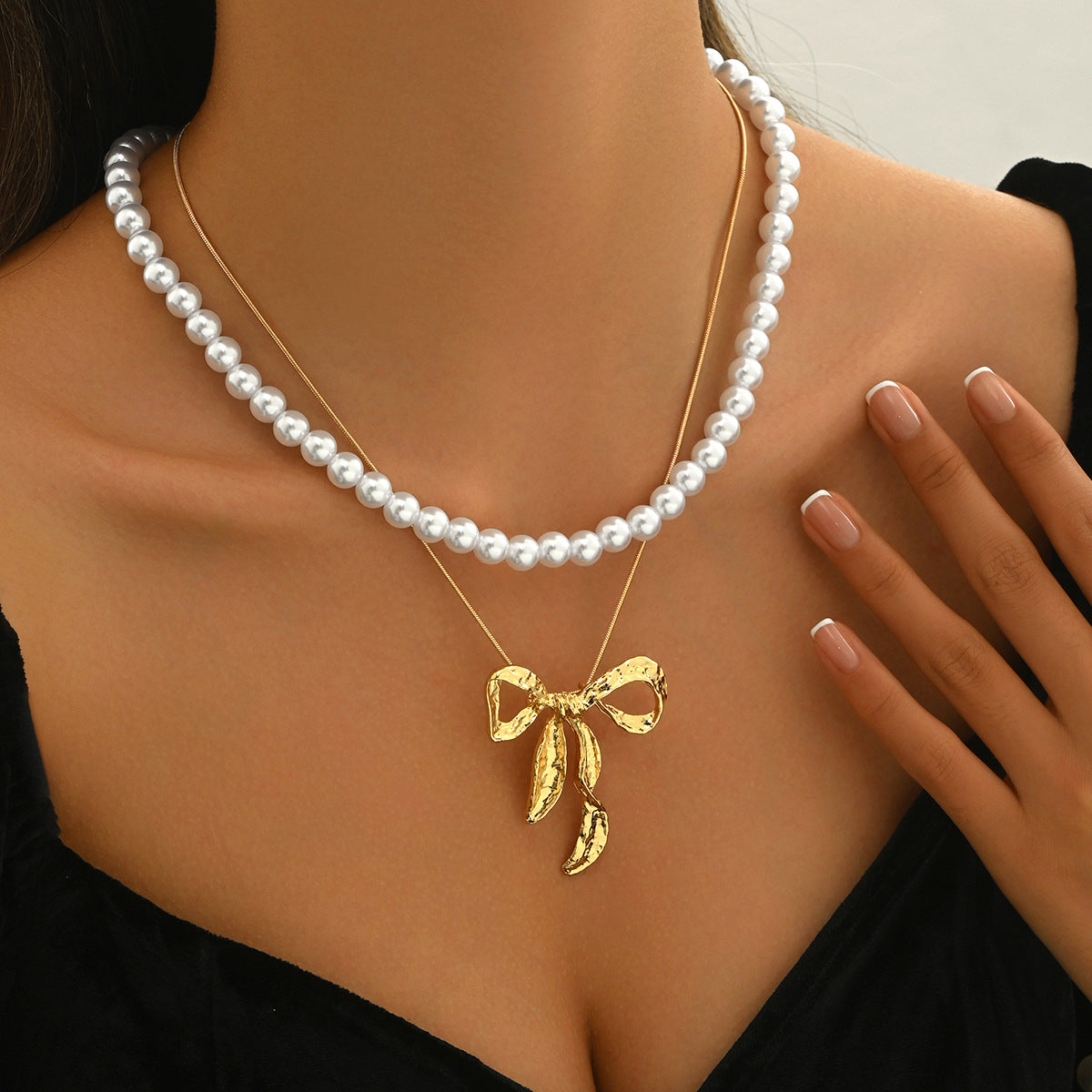 Wholesale three-dimensional bow pendant necklace