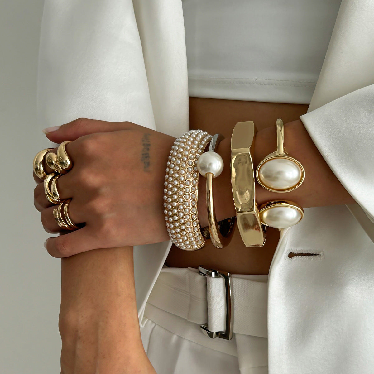 Wholesale Open cut edge elliptical two-color alloy Bracelet set