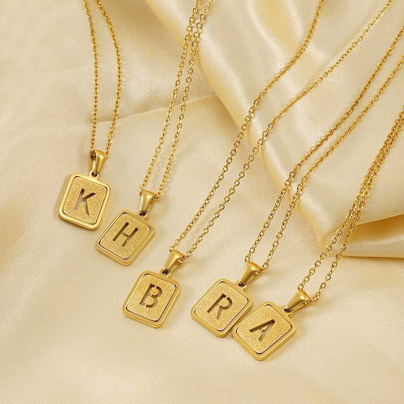 Wholesale 18K stainless steel hollow 26 English letter necklace