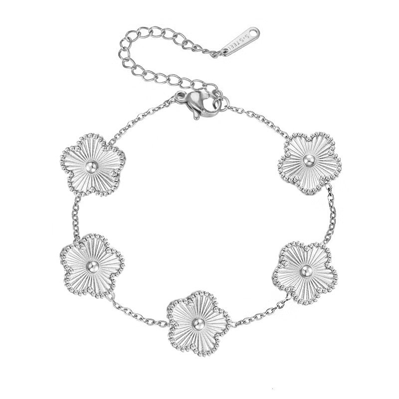 Wholesale  titanium steel laser five-leaf flower bracelet