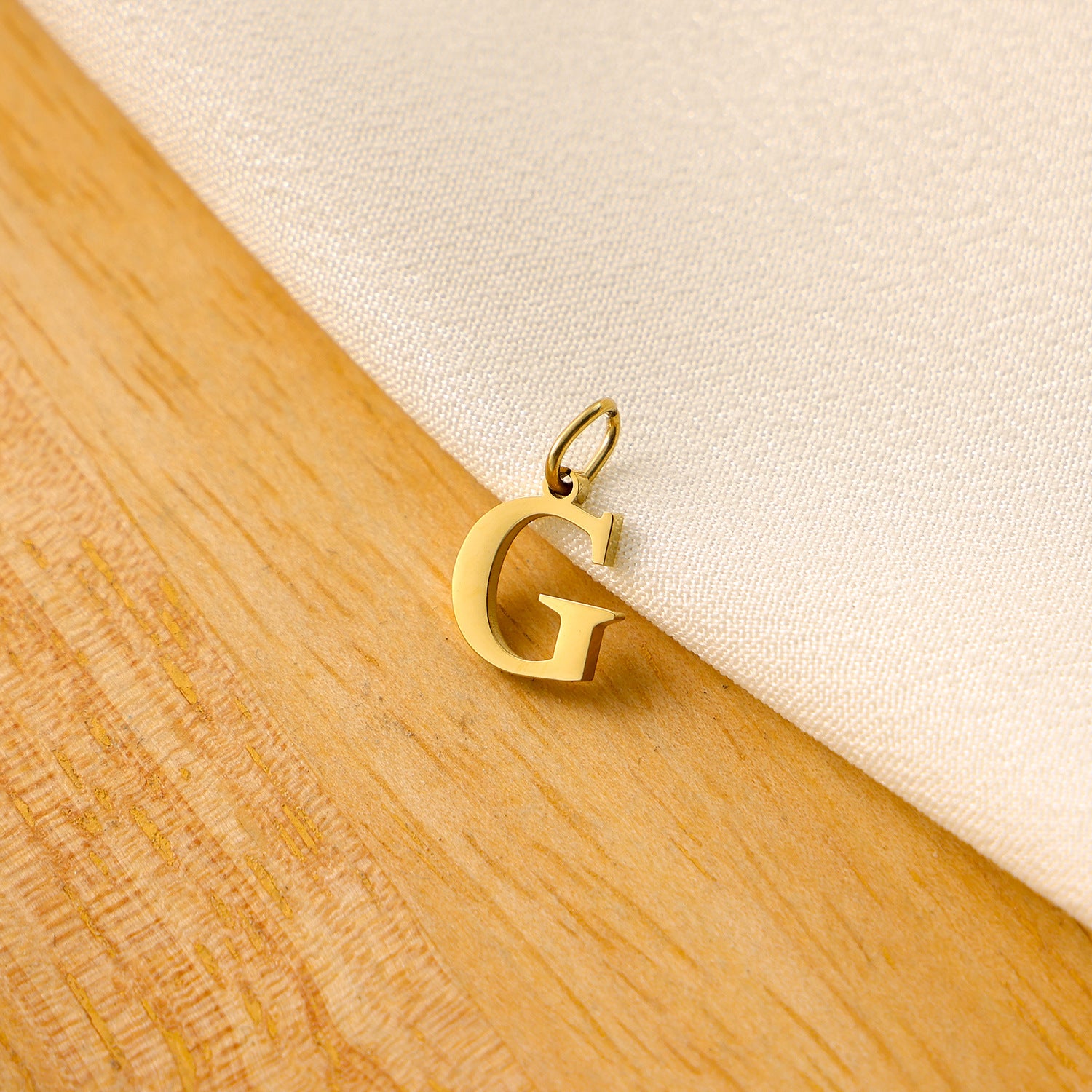 Wholesale Titanium steel letter pendant