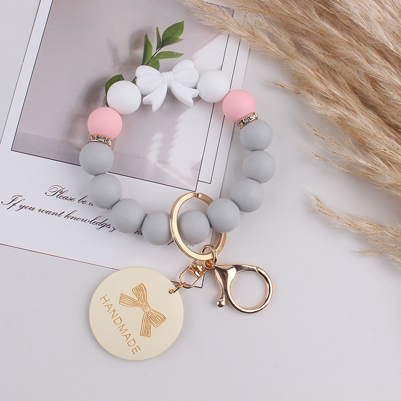 Wholesale Mother' s Day Handmade Gift: Bow-Shaped Silicone Keychain Wristlet