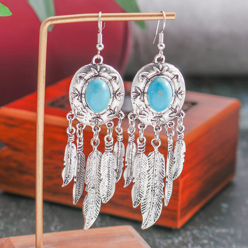 Wholesale Bohemian style turquoise tassel feather earrings