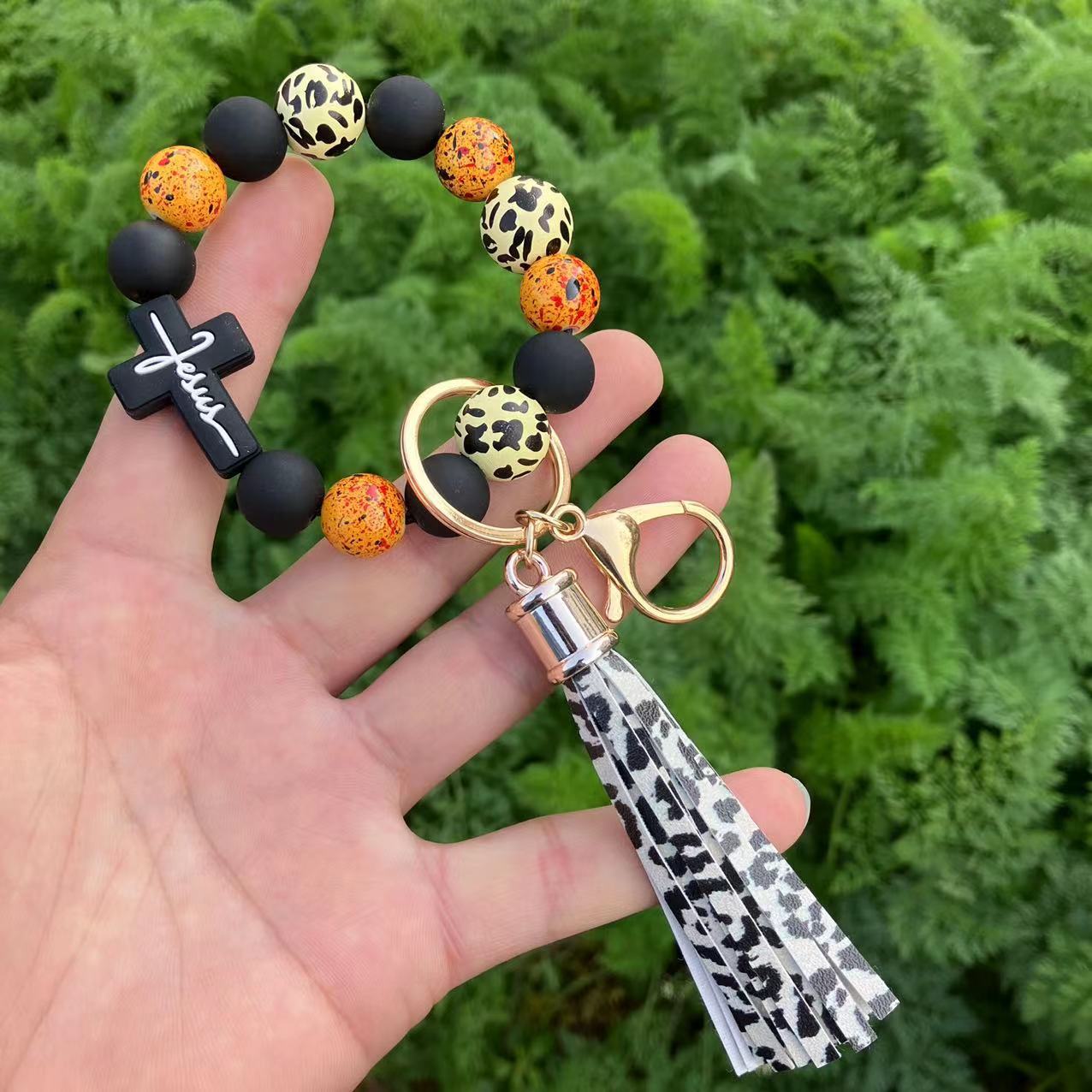 Wholesale Chic Leopard Print Silicone Bead Bracelet Keychain With Cross Tassel Stylish Bag Charm Or Everyday Wear