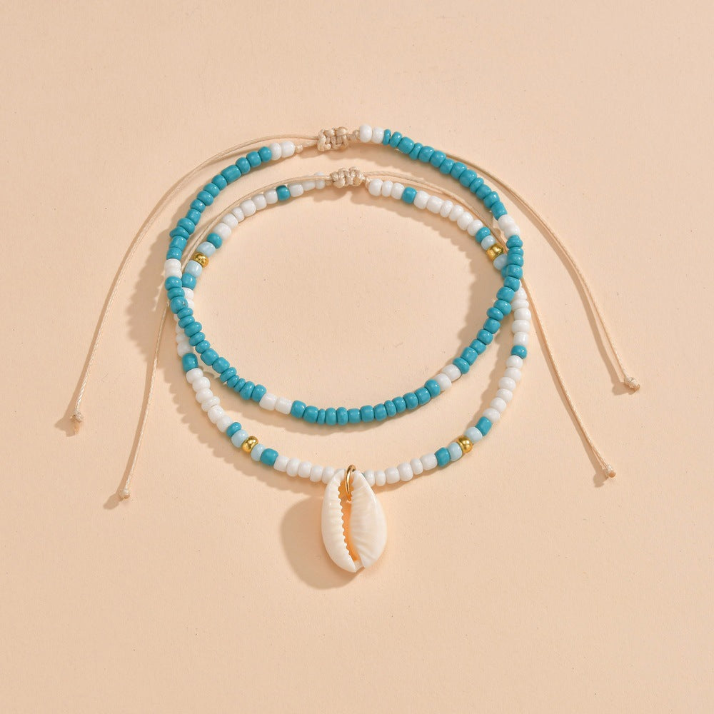 Wholesale Ocean style white and blue rice beads mixed with shell pendant adjustable anklet