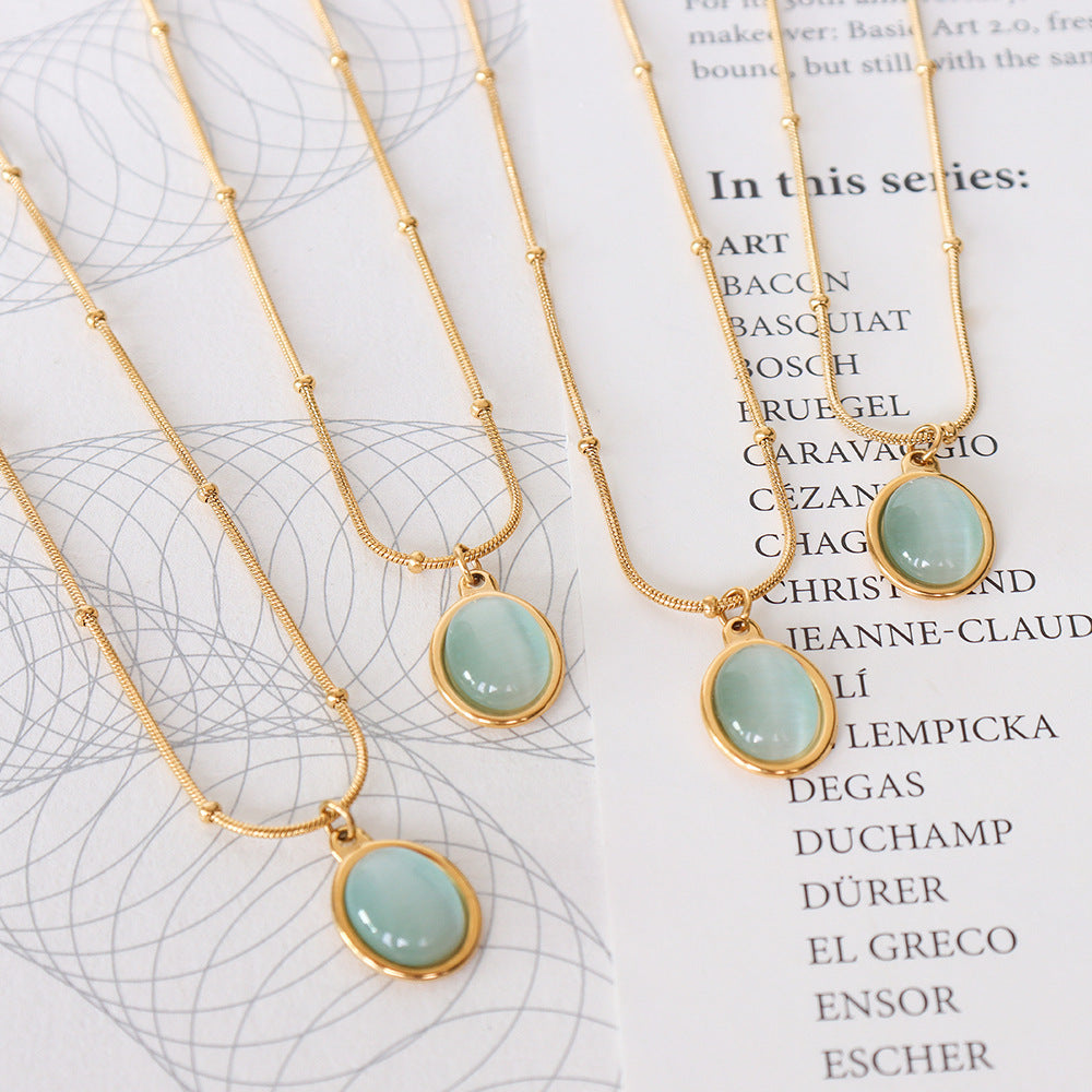Wholesale French Retro Titanium Steel 18K Gold Plated Cat Eye Oval Pendant Necklace Women S Collarbone Chain Fashion Accessory