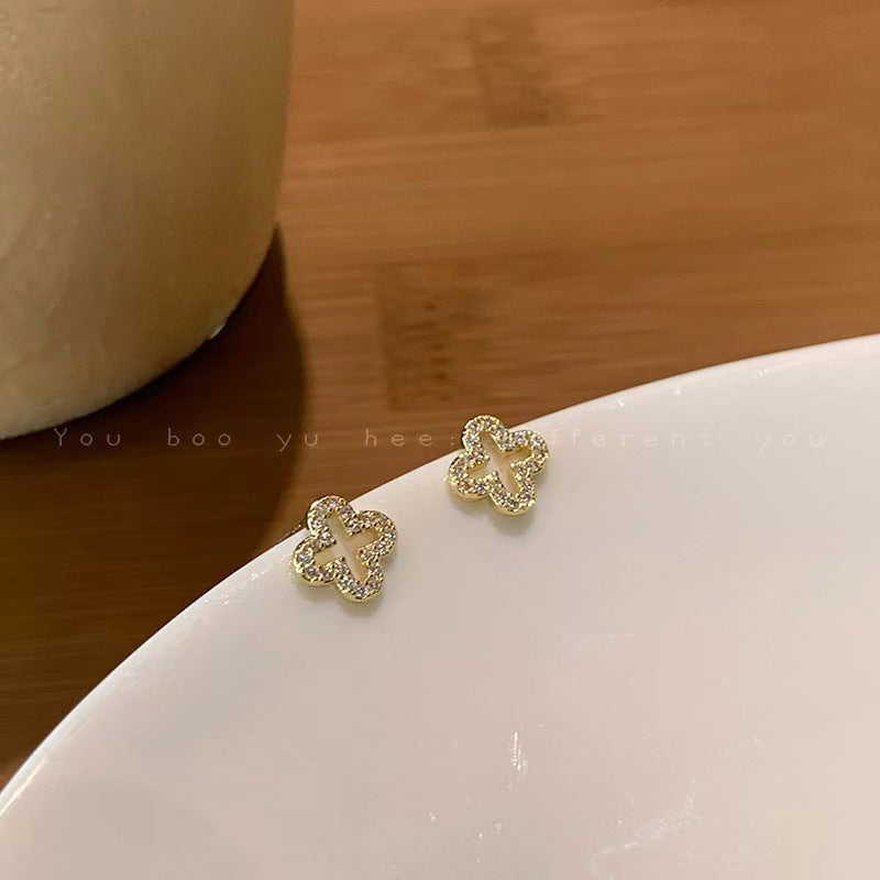 Wholesale silver needle diamond leaf hollow earrings