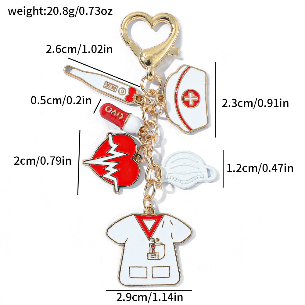 Wholesale Classic nurse cap thermometer pill mask heartbeat nurse suit zinc alloy keychain