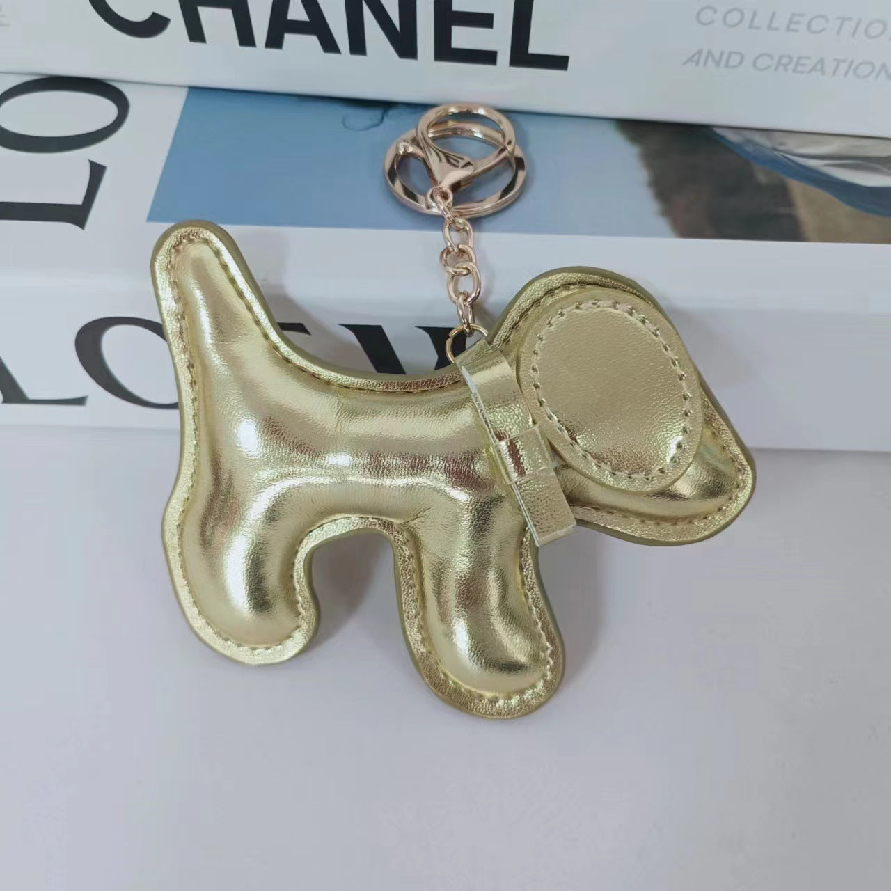 Wholesale Cute Bow Metallic Red Leather Puppy Keychain Bag Charm Boutique Resale