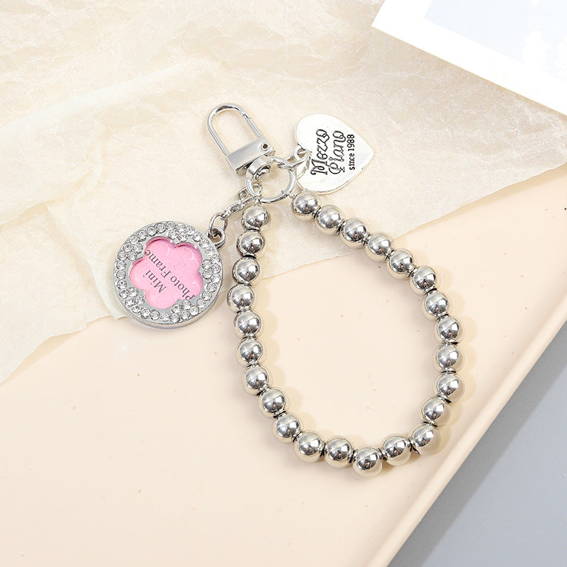 Wholesale Diamond-inlaid five-pointed star tag metal texture dog bone keychain