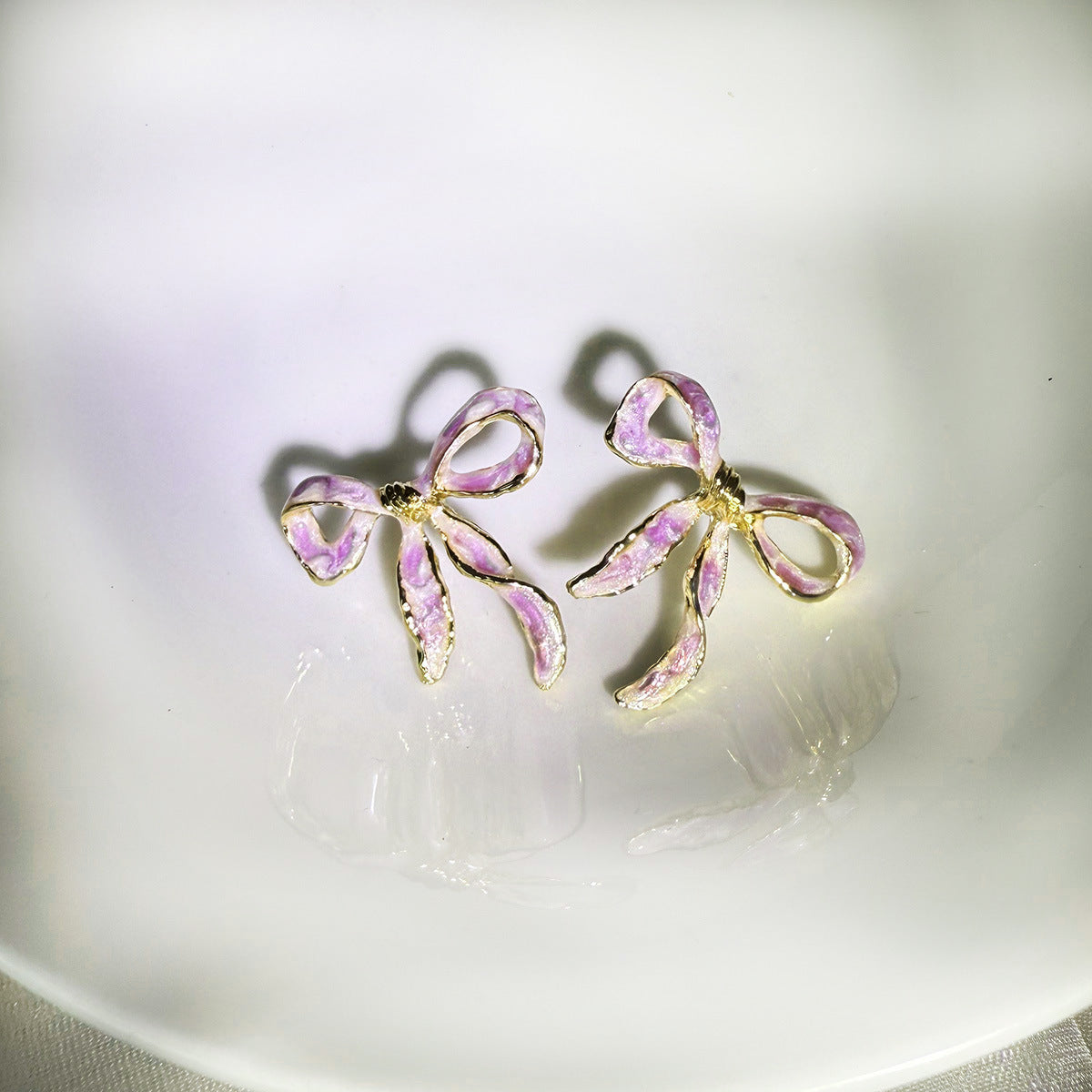 Wholesale elegant enamel colored brushed bow earrings