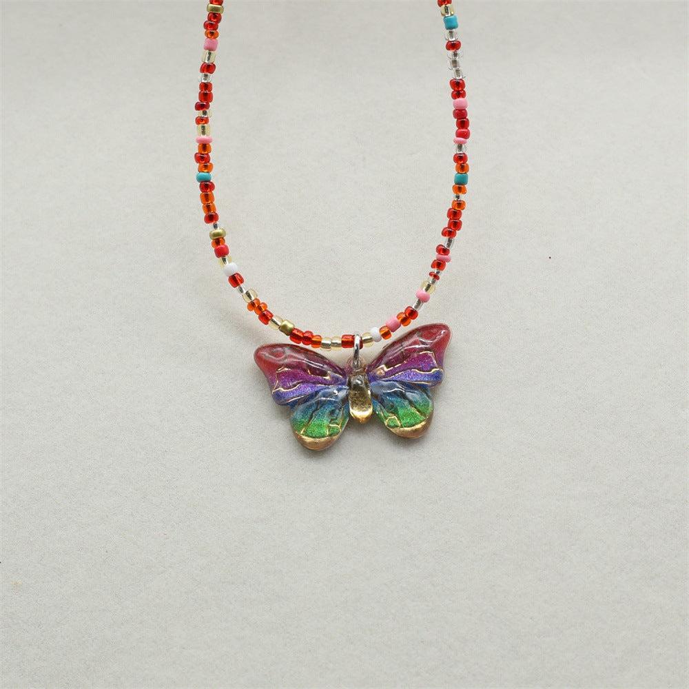 Wholesale gradient color bronzing butterfly sweet pendant rice beads beaded necklace