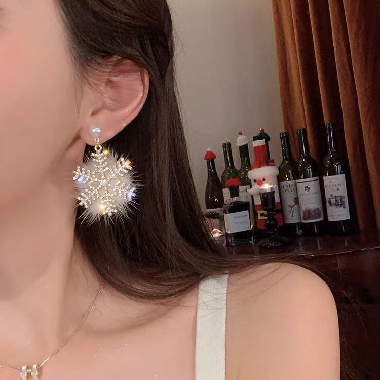 Wholesale White Plush Ball Snowflake Earrings