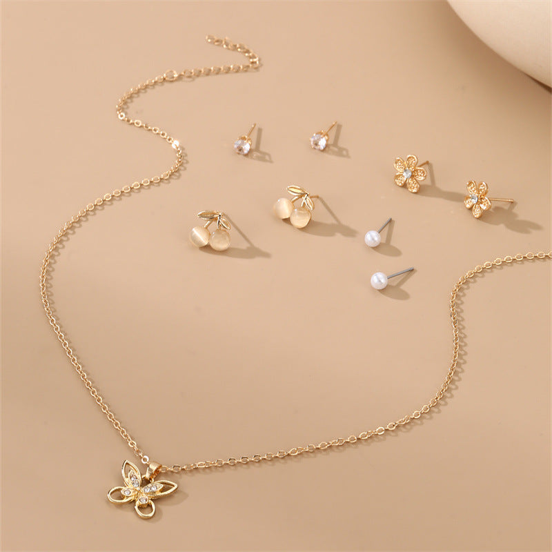 Wholesale  Gold Hollow Earrings Pearl Flower Jewelry