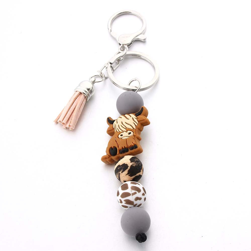 Wholesale Cartoon Cow Teeth Silicone Bead Keychain