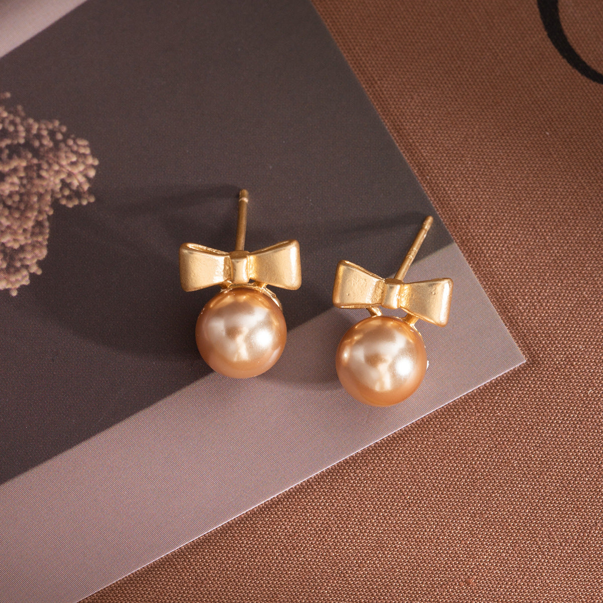 Wholesale Silver Needle Bow Pearl Earrings