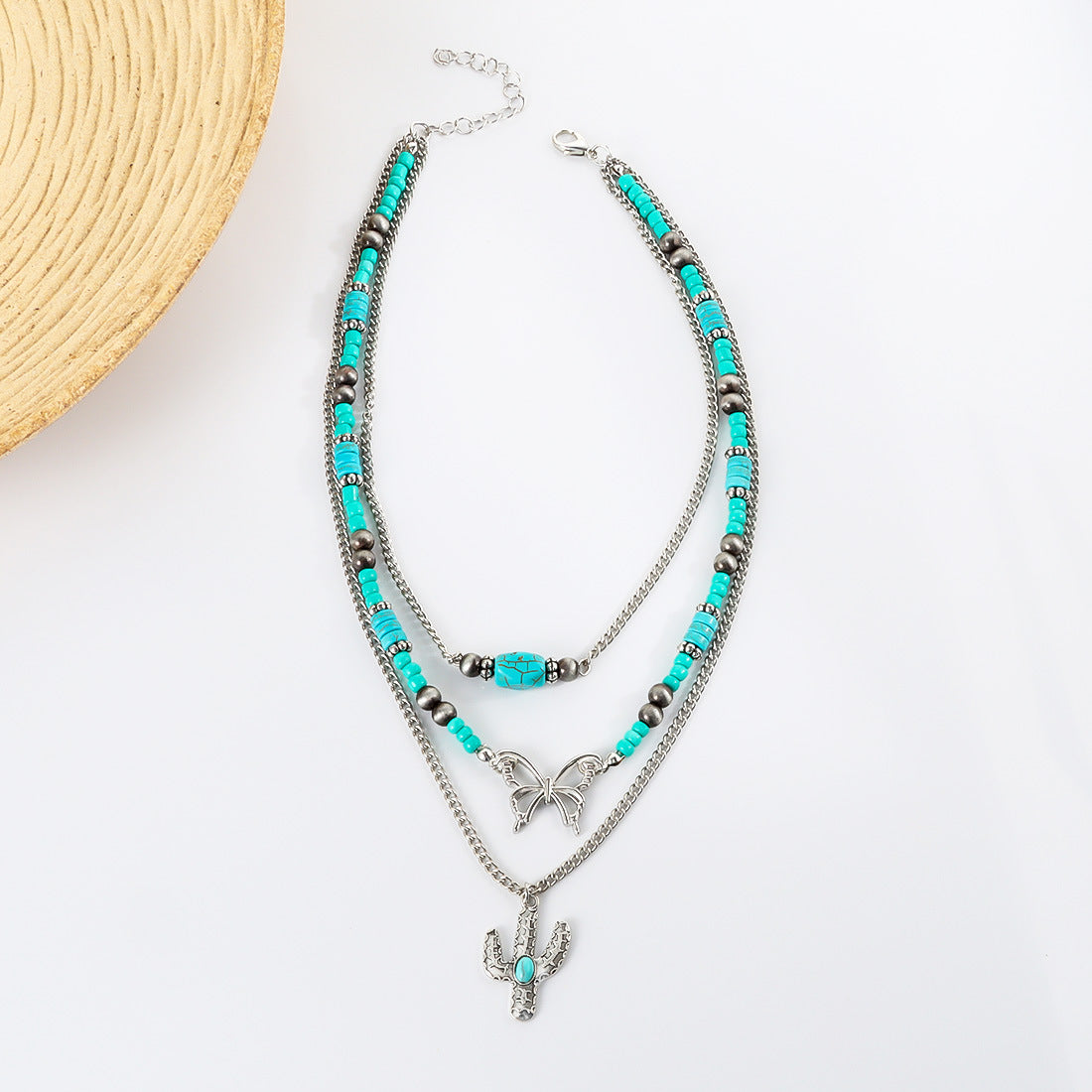 Großhandel Retro türkiser Schmetterlings Schlüsselblattkette Ethnische Kaktuskette