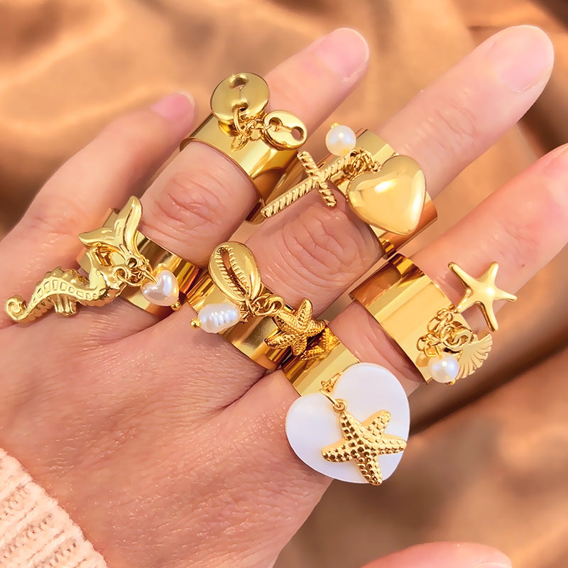 Wholesale Stainless steel starfish shell ring women' s fashion pendant design cross,  titanium steel open ring