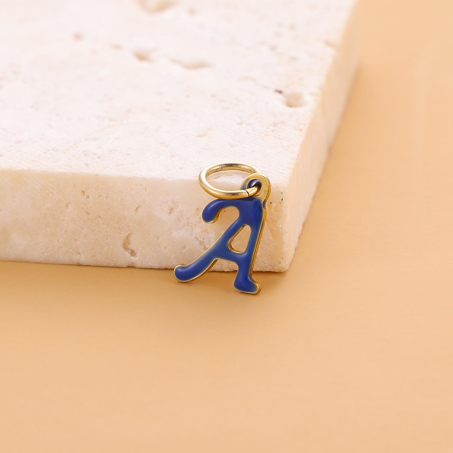 Wholesale Colorful 26 English letter pendant oil drop titanium steel vacuum plating pendant