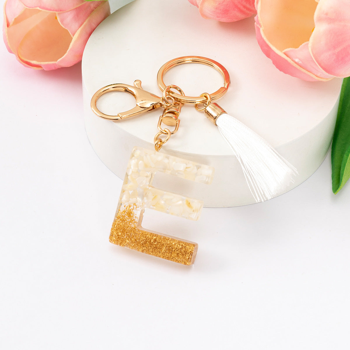 Wholesale Gold Foil New Resin Crystal Glue White Tassel Color English Digital Keychain