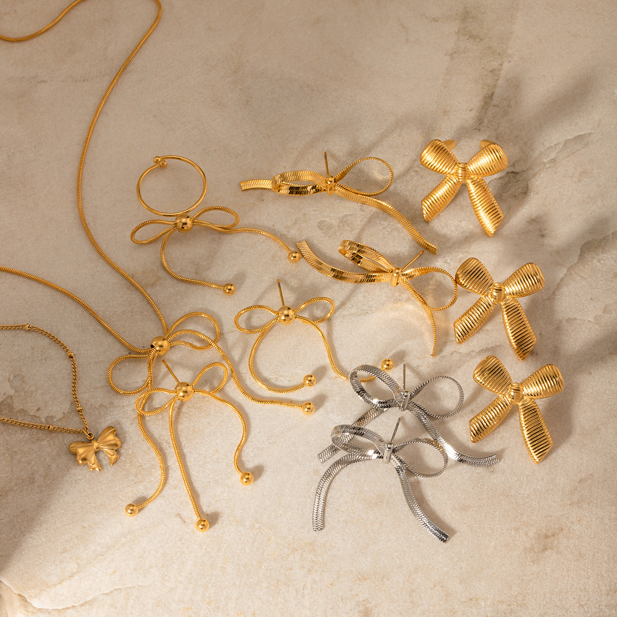 Wholesale Vintage Bowknot Stainless Steel Earrings Necklaces