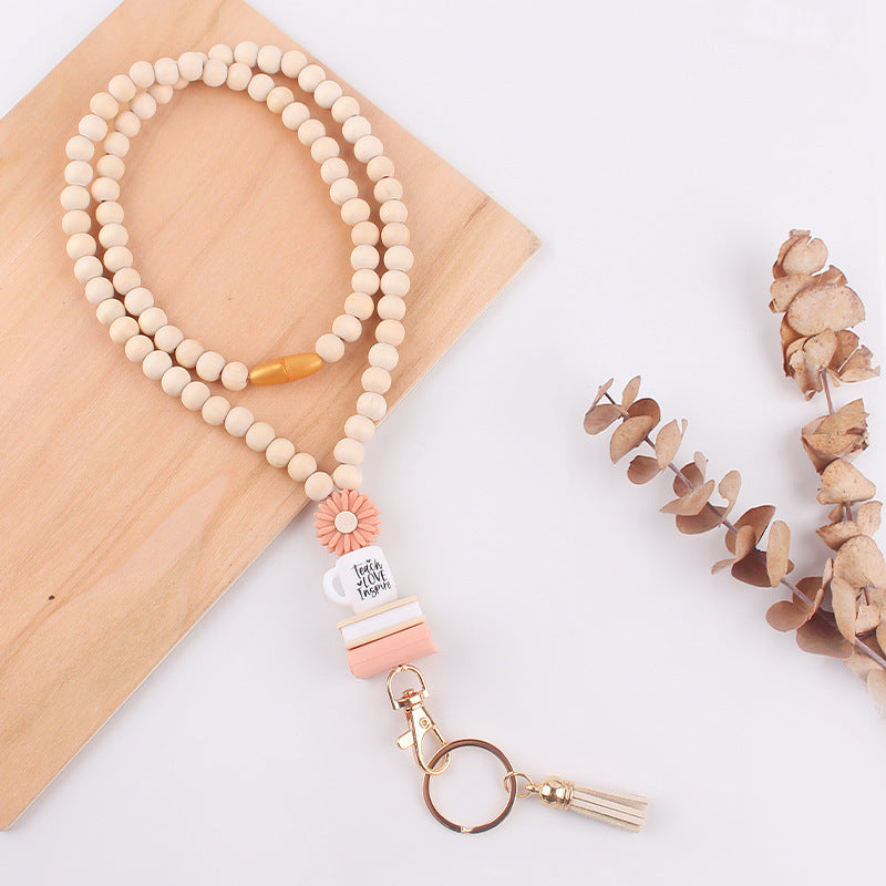 Wholesale Wooden Bead Necklace Keychain Silicone Daisy Book Beaded Tassel Necklace