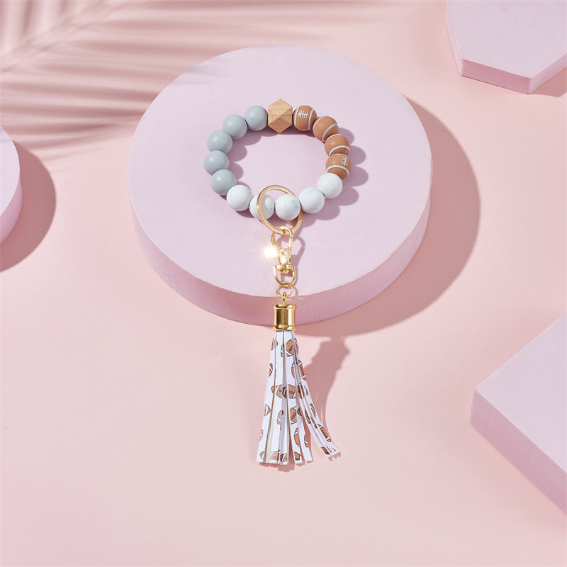 Wholesale Football Basketball Baseball Silicone Beaded Leather Tassel Wrist Keychain