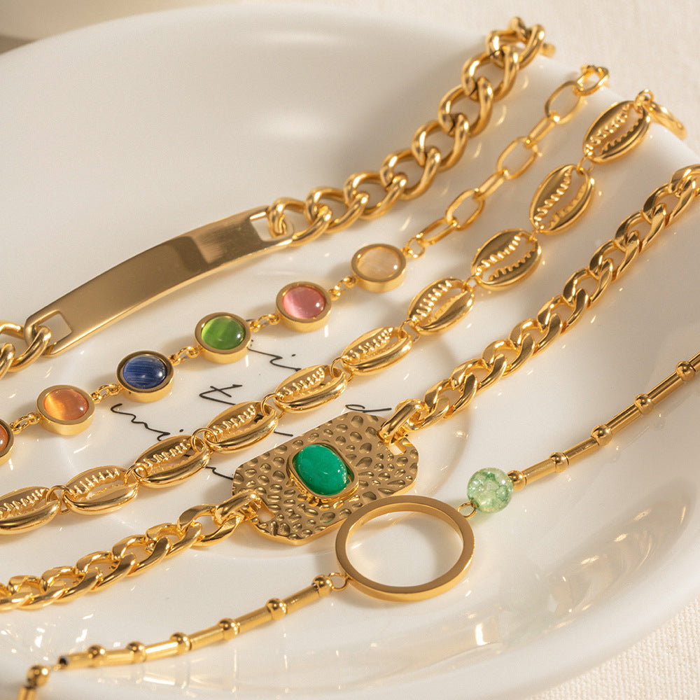 Wholesale Ring Green Stone Stainless Steel Fantasy Cat's Eye Hollow Shell Bracelet ACC-BT-WanX004