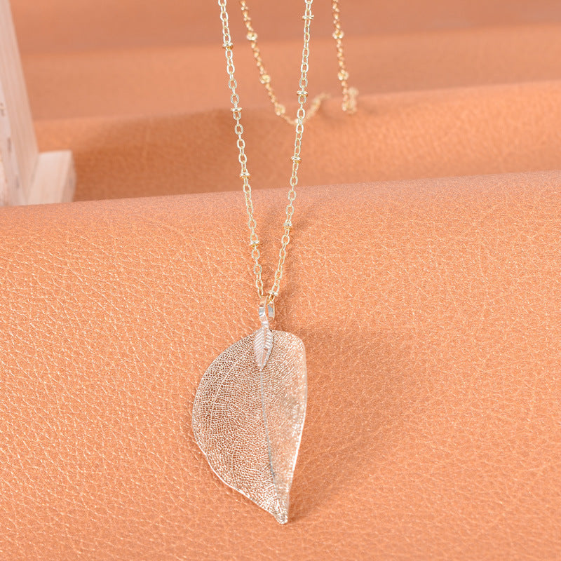 Wholesale simple hollow leaf sweater chain