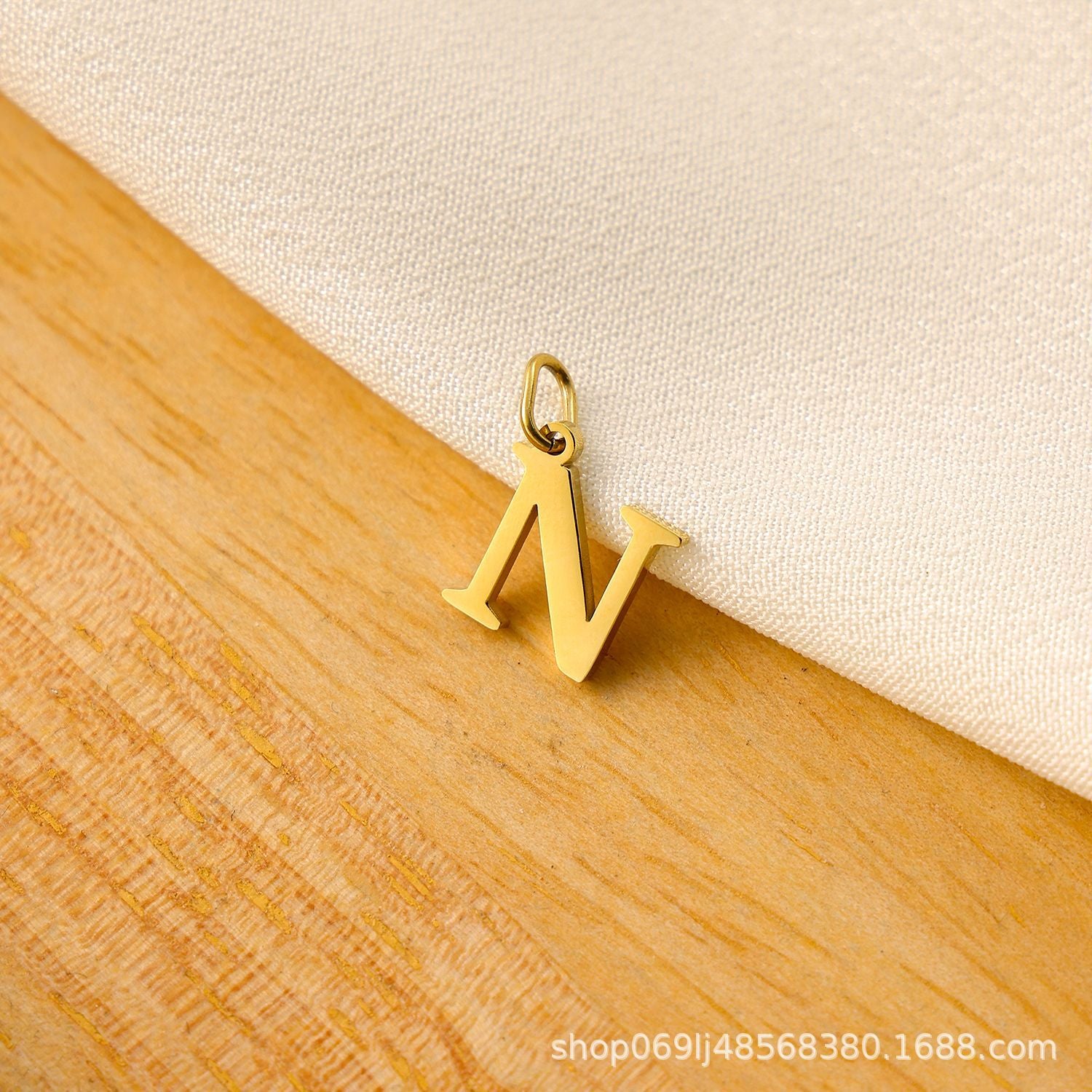 Wholesale Titanium steel letter pendant
