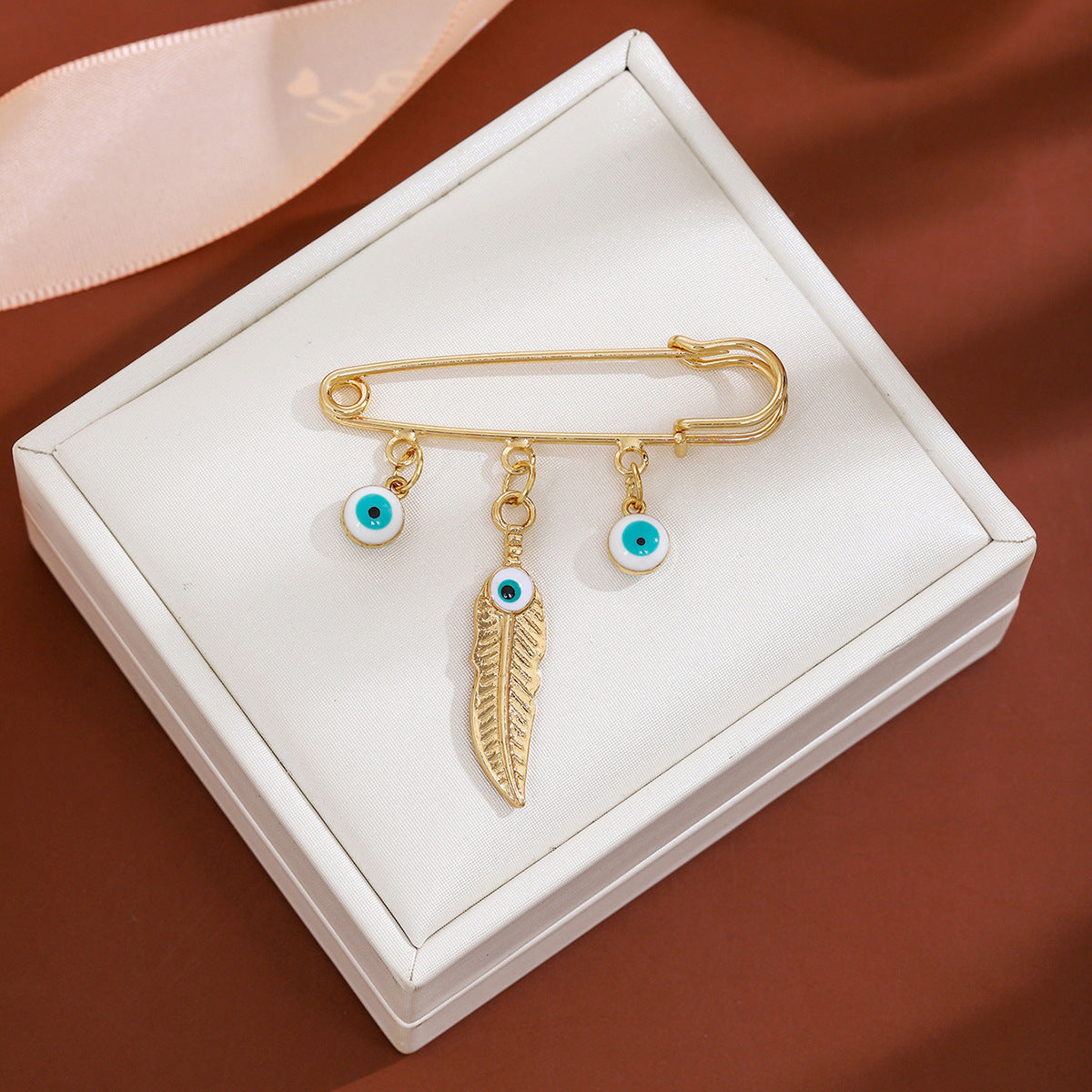 Wholesale Diamond-encrusted Devil' s Eye Tassel Brooch