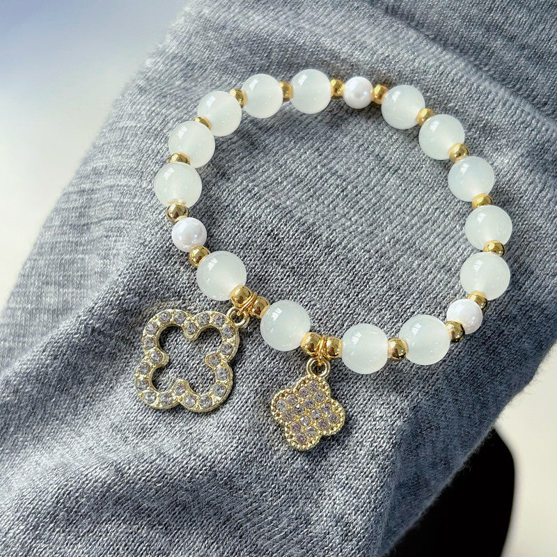 Wholesale Four Leaf Clover Imitation Cat S Eye Glass Pearl Bracelet Women S Everyday Wear Boutique Resale Jewelry Accessory