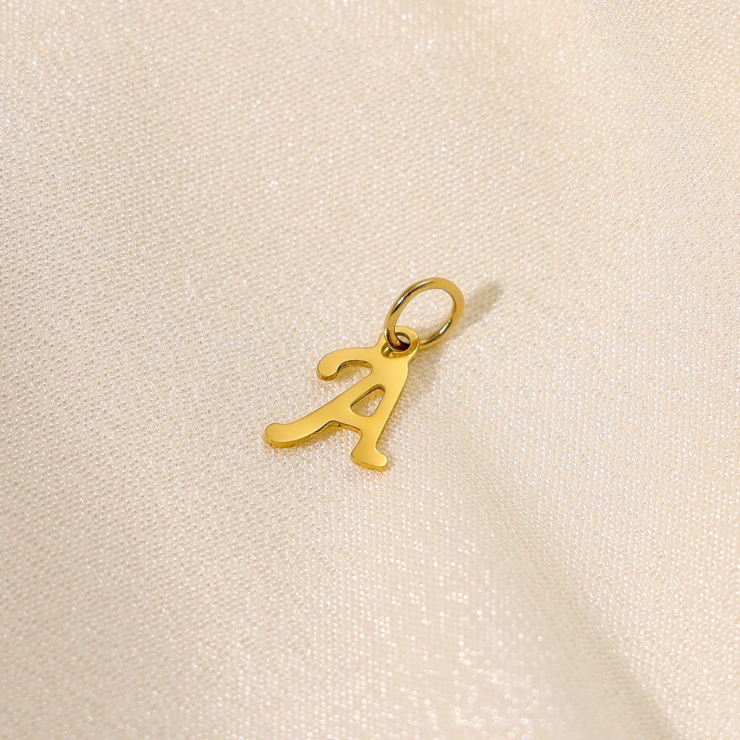 Wholesale 26 English letters stainless steel letter pendant