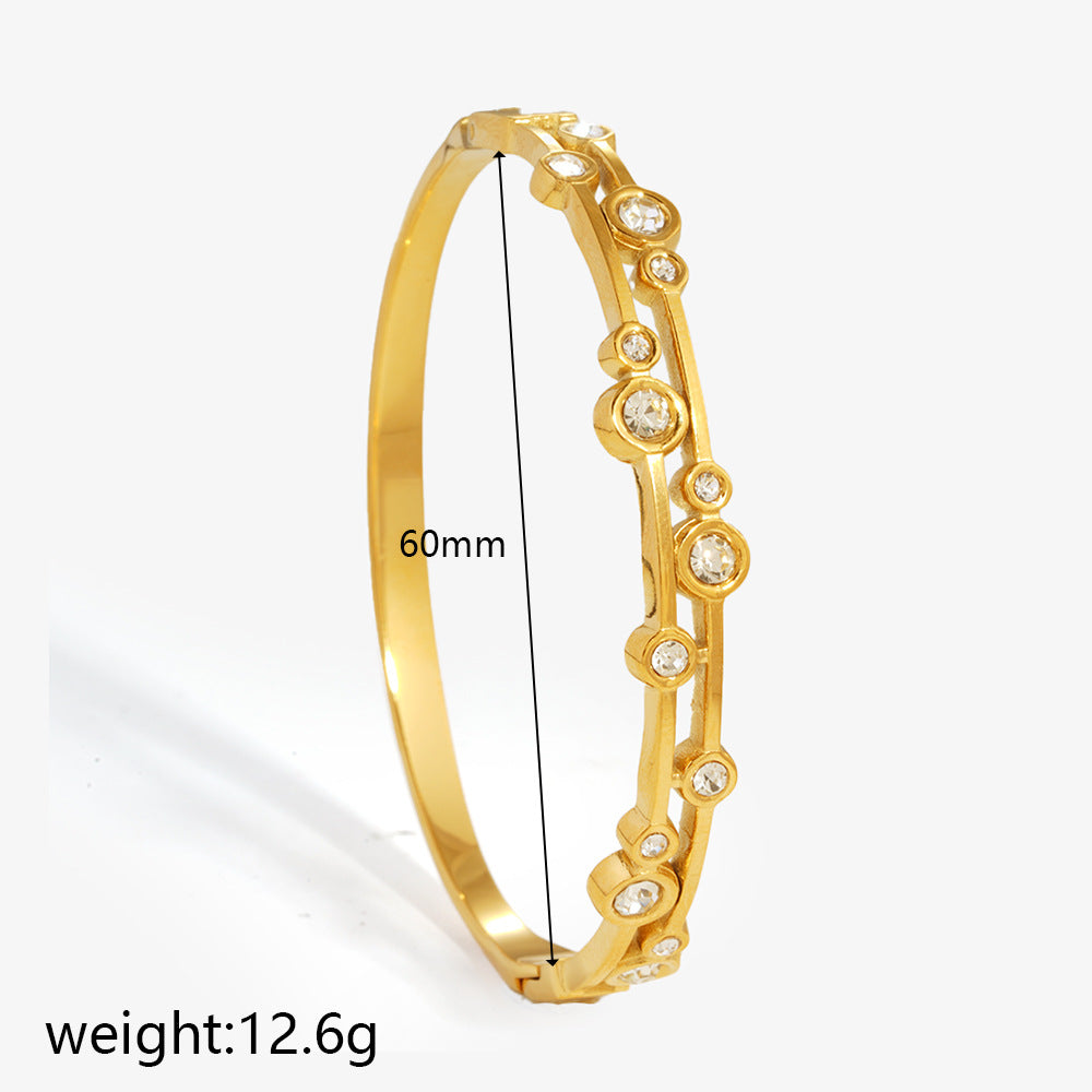 Wholesale Titanium Steel Geometric Starburst Bangle with Inlaid Diamonds