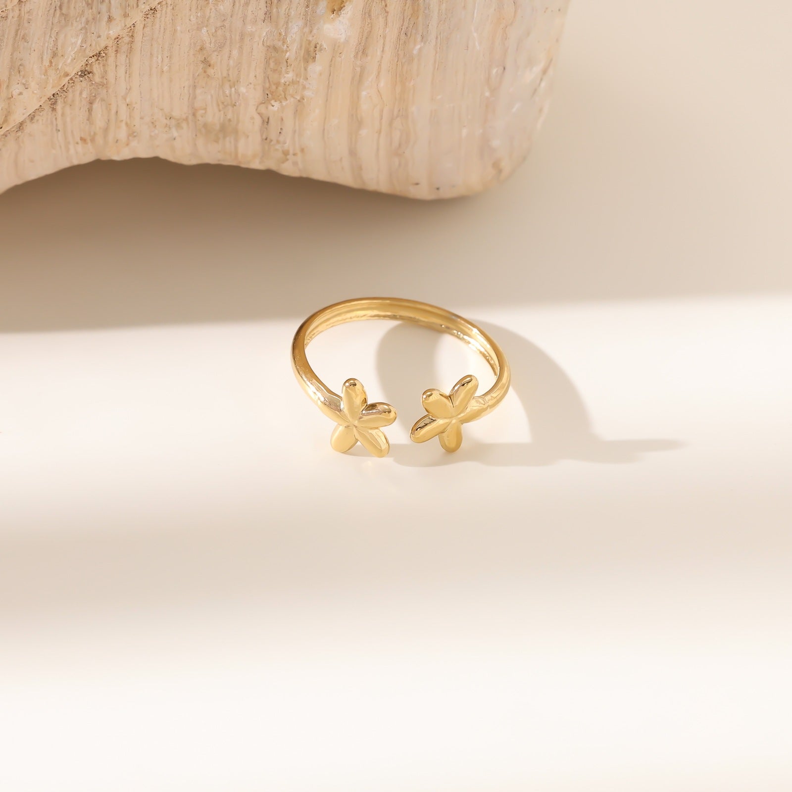 Wholesale Stainless steel gold-plated adjustable starfish flower ring
