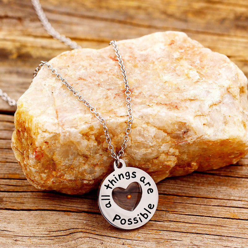 Wholesale stainless steel round lettering mustard seed pendant necklace