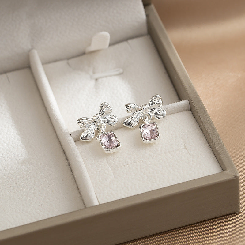 Wholesale light luxury bow pink stud earrings