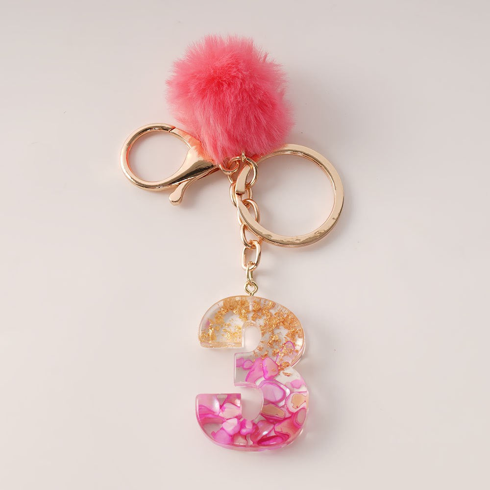 Wholesale Creative and Cute Red Fur Ball Letter Shell Handmade Glue Keychain Exquisite Pendant