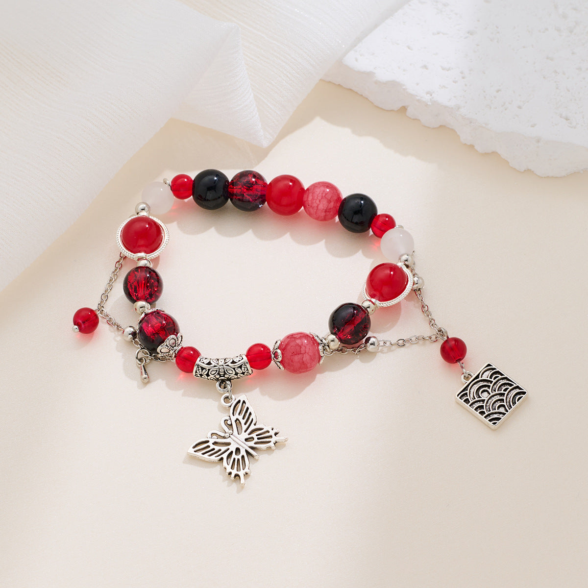 Bracciale con perline di farfalle e fiori all'ingrosso