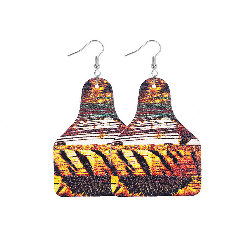 Wholesale Retro Western Cowboy Old Style Flower Bull Head Ethnic Style Print Leather Earrings