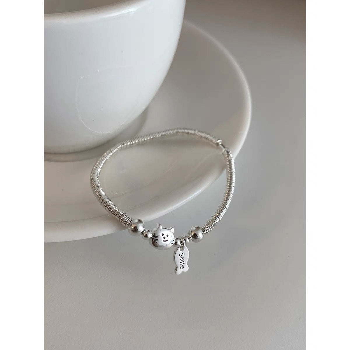 Wholesale Simple Beaded Bracelet Featuring a Kitten Eating Fish